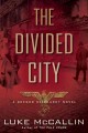 The divided city  Cover Image